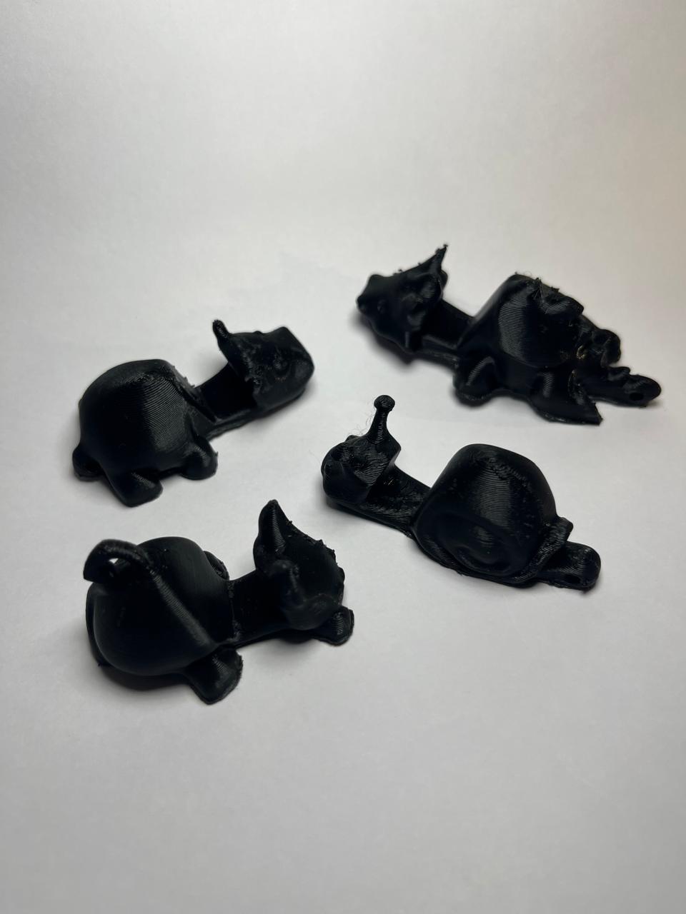 🦕🖤 4-in-1 Animal Mobile Stand & Keychain Set – Cute Dino, Bunny, Hippo & Snail (3D Printed | Black Edition)