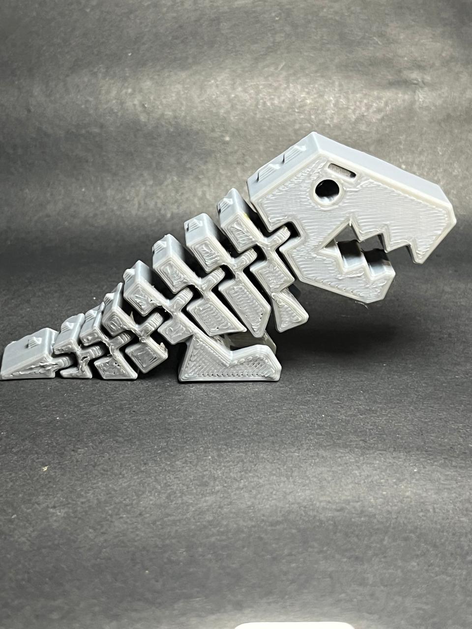 🦖 Flexi Dino Chain Keychain – 3D Printed T-Rex with Movable Body (Metallic Silver Edition)