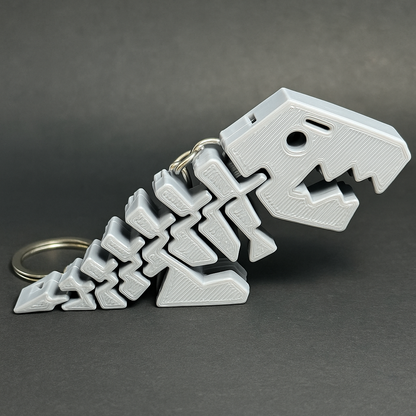 🦖 Flexi Dino Chain Keychain – 3D Printed T-Rex with Movable Body (Metallic Silver Edition)